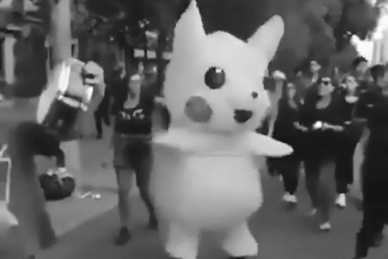 Read more about the article Viral Pikachu Protester Dances In Front Of Cannon Cops