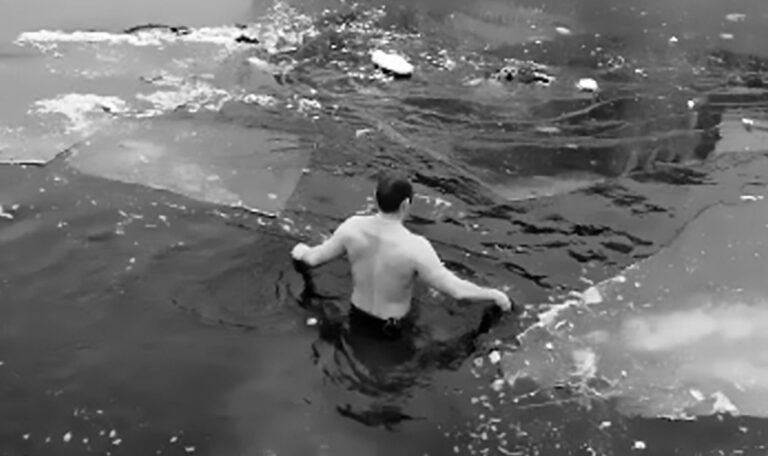 Read more about the article Man Plunges Into Icy River To Rescue Drowning Dog