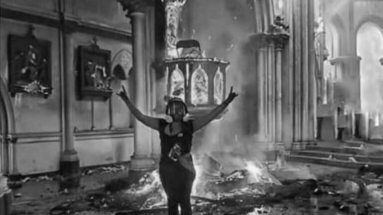 Read more about the article Woman Cheers As Ancient Church Burns
